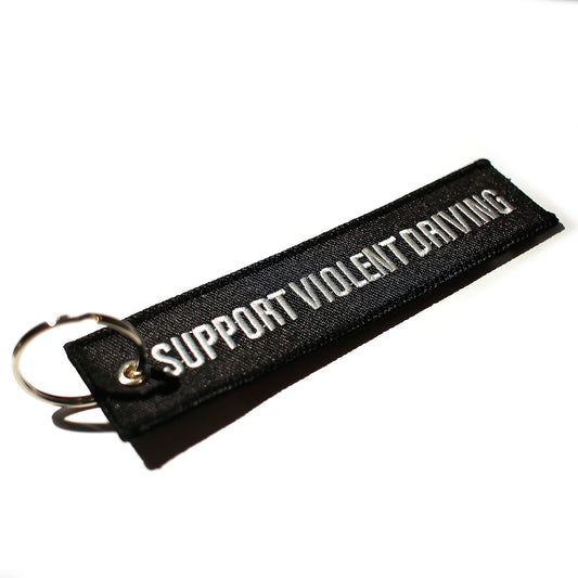 Black keychain with 'Support Violent Driving' text in White