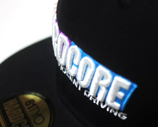 Close-up of a black cap with 'Hardcore' branding on a white background
Hardcore Tokyo Rainbow Logo Snapback