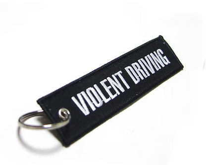 Keychain with 'Violent Driving' text on a black background
Hardcore Tokyo Team Flight Tag