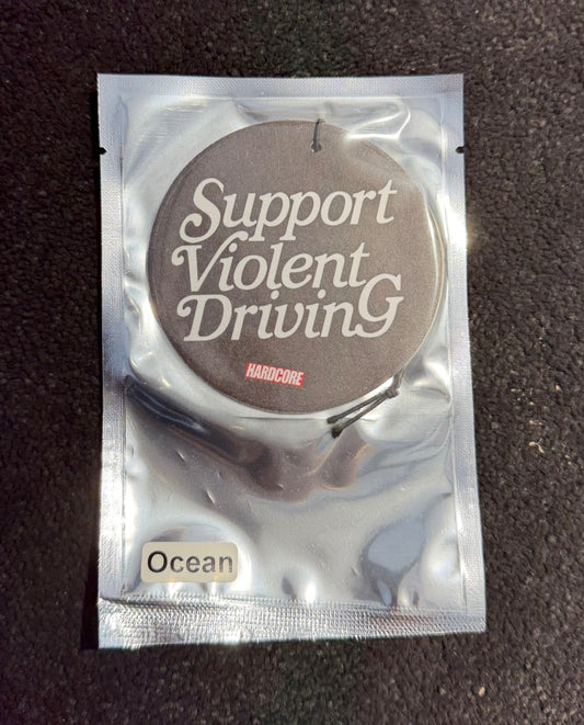 Silver packaging with 'Support Violent Driving' text on a dark background. Hardcore Tokyo Typo Logo Air Freshener with an Ocean Flavour