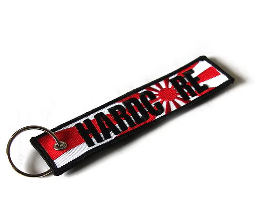 Keychain with 'HARDCORE' text on a red, white, and black striped background
Rising Sun